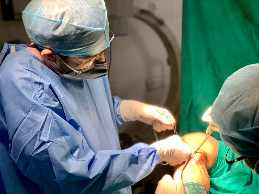 Dr DP Sharma performing operation